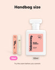 hideaway. Black Essence perfume 10ml travel size beside the 50ml bottle, handbag size