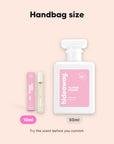hideaway. Flower Power perfume 10ml travel size beside the 50ml bottle, handbag size