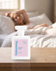 hideaway. Sugar Baby perfume 50ml bottle on a bedside table in warm morning light