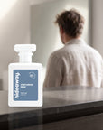 hideaway. Centurion Man perfume 50ml bottle on a stone dresser in soft morning light