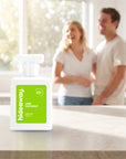 hideaway. Lime Coconut perfume 50ml bottle on a stone benchtop in a bright kitchen