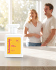 hideaway. Wild Mango perfume 50ml bottle on a stone benchtop in a bright kitchen