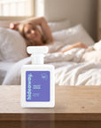 hideaway. Velvet Affair perfume 50ml bottle on a bedside table in warm morning light
