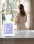 hideaway. Bubba Hubba perfume 50ml bottle on a marble ledge by a sunlit window