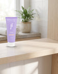 hideaway. Vanilla Caramel Body Scrub on a stone bathroom counter in soft daylight
