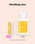 hideaway. Pineapple Coconut perfume 10ml travel size beside the 50ml bottle, handbag size
