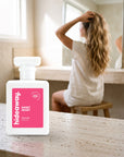 hideaway. Sweet Heart perfume 50ml bottle on a travertine vanity while she gets ready in the morning