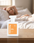 hideaway. Royal Empire perfume 50ml bottle on a bedside table in warm morning light