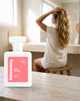 hideaway. Chic Allure perfume 50ml bottle on a travertine vanity while she gets ready in the morning